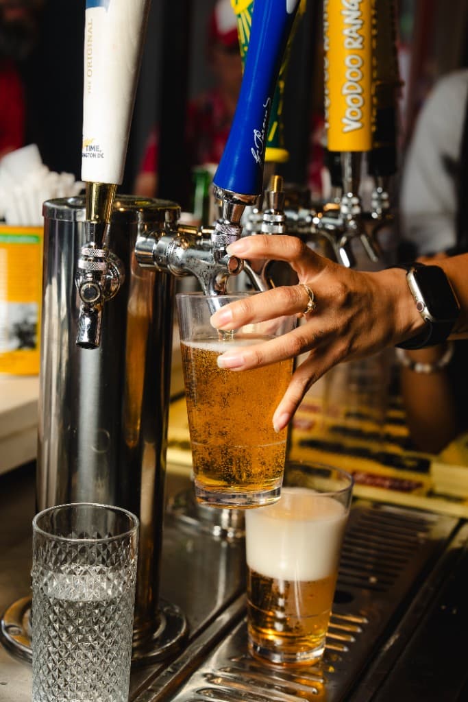 Draft beer pour at Outfield Bar — Peroni and craft taps steps from Nationals Park